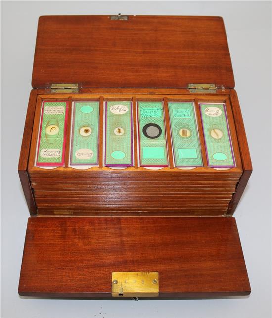 A Marratt & Ellis lacquered and bronzed brass monocular microscope, 8.25in.